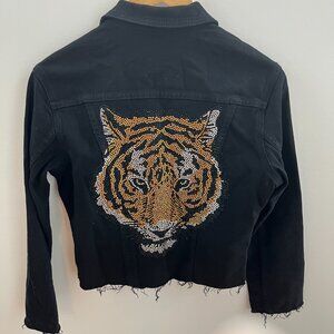 L'Agence Black Jean Jacket with a Tiger on the back.